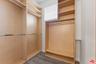 Walk-in closet featuring light