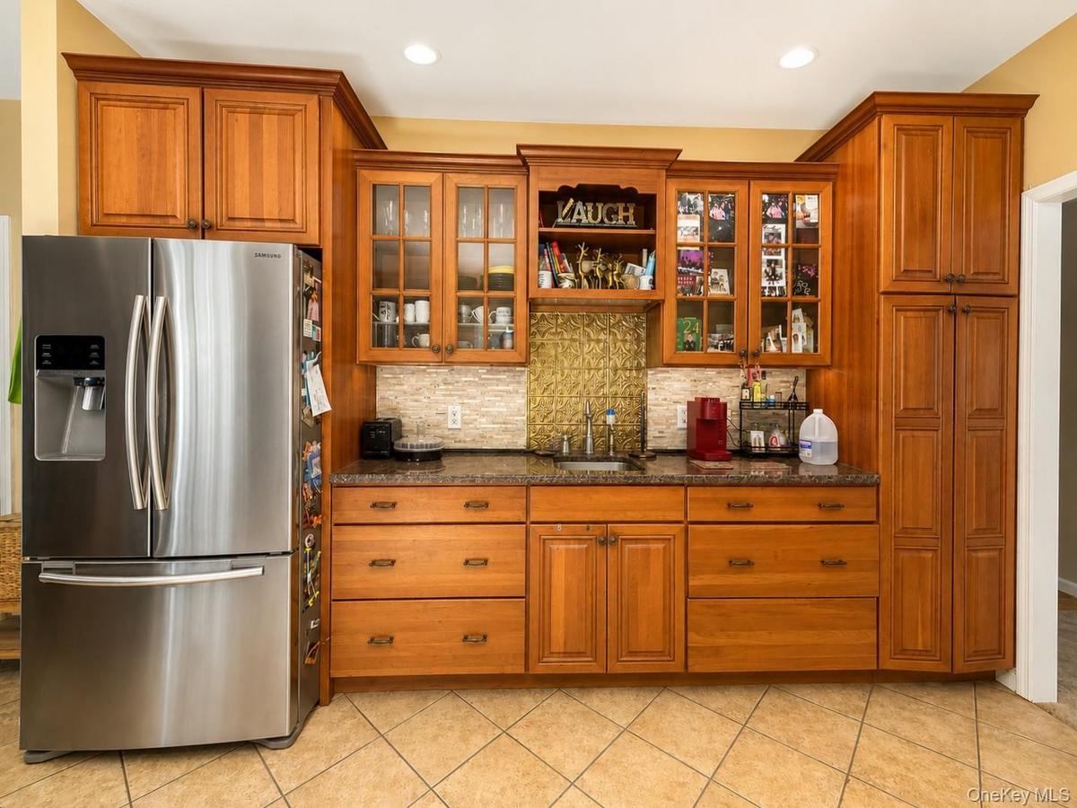 Separate Coffee Bar with cabinents, sink and Pantry cabinet