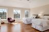 Sunny bedroom facing east with stunning en-suite bathroom.