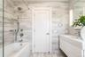 Beautifully tiled en-suite.