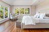 Peaceful primary bedroom - a private sanctuary.