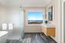 Spacious primary bathroom with Duravit vanities  and Dornbracht fixtures.