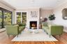 The grand room has Italian oak flooring and gas fireplace .