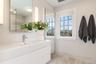 Beautifully tiled en-suite bathroom.