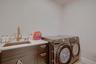 Laundry Room off of the Kitchen - Plenty of Room for Storage