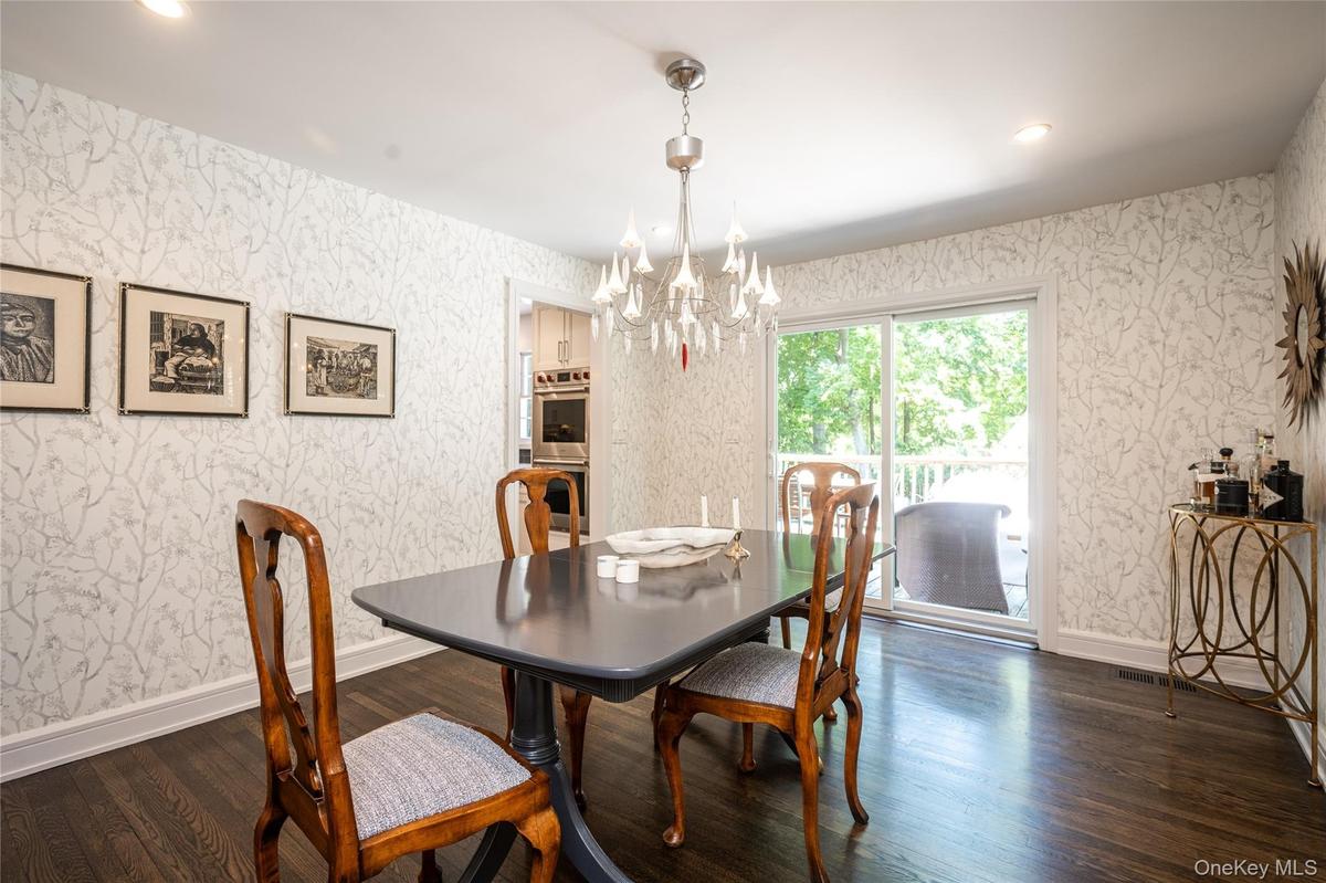 Formal Dining Room with Sliding Glass Doors to Deck