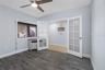 .. Guest Bedroom #2 Located on Main Level. Electric Storm Shutters - New Plank Tile Floors.