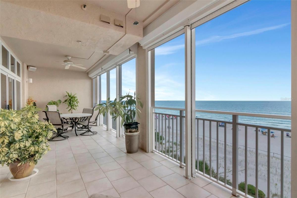 Beachfront Condo with 300 Sqft private balcony overlooking the Beach! Direct private access to the beach from Chez Soleil Pool/Spa area below.