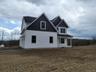 Distinctive Colonial architecture highlighted by multiple gables and elegant exterior finishes that create a measurable first impression.