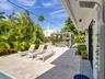 Pool Lounge Features Travertine Deck