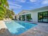 Pool Lounge Features Travertine Deck