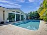 Pool Lounge Features Travertine Deck