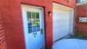 Entrance to 114 Mansion 'St 2nd fl apt off driveway