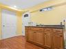 Kitchen with sink and wood-type flooring