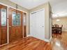 Foyer with hardwood / wood-style flooring