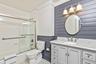 Upper Bathroom with Tub and Vanity