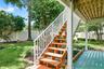 Newly rebuilt trex stairs from upstairs deck to backyard/downstairs patio.