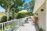 Trex upstairs deck overlooking beautifully landscaped backyard.
