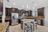 Window Overlooking the Serene Pond. Be creative with a Pass Thru to Summer Kitchen in the Future! Full Gourmet Kitchen with Crown Molding, Island, Pen