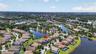 Picturesque Views of the Community from 2nd Floor! Aerial View of WCI Lennar Home on Premium Water Lot in Waterleaf Community! Located Near Entrance &