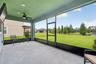 Covered and Screened Lanai with Double Ceiling Fans, Pre-Wired for Speakers and T.V. Large Screen Panels for Gorgeous View of Peaceful Natural Landsca