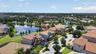Picturesque Views of the Community from 2nd Floor! Aerial View of WCI Lennar Home on Premium Water Lot in Waterleaf Community! Located Near Entrance &