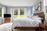 Primary ensuite bedroom on main floor