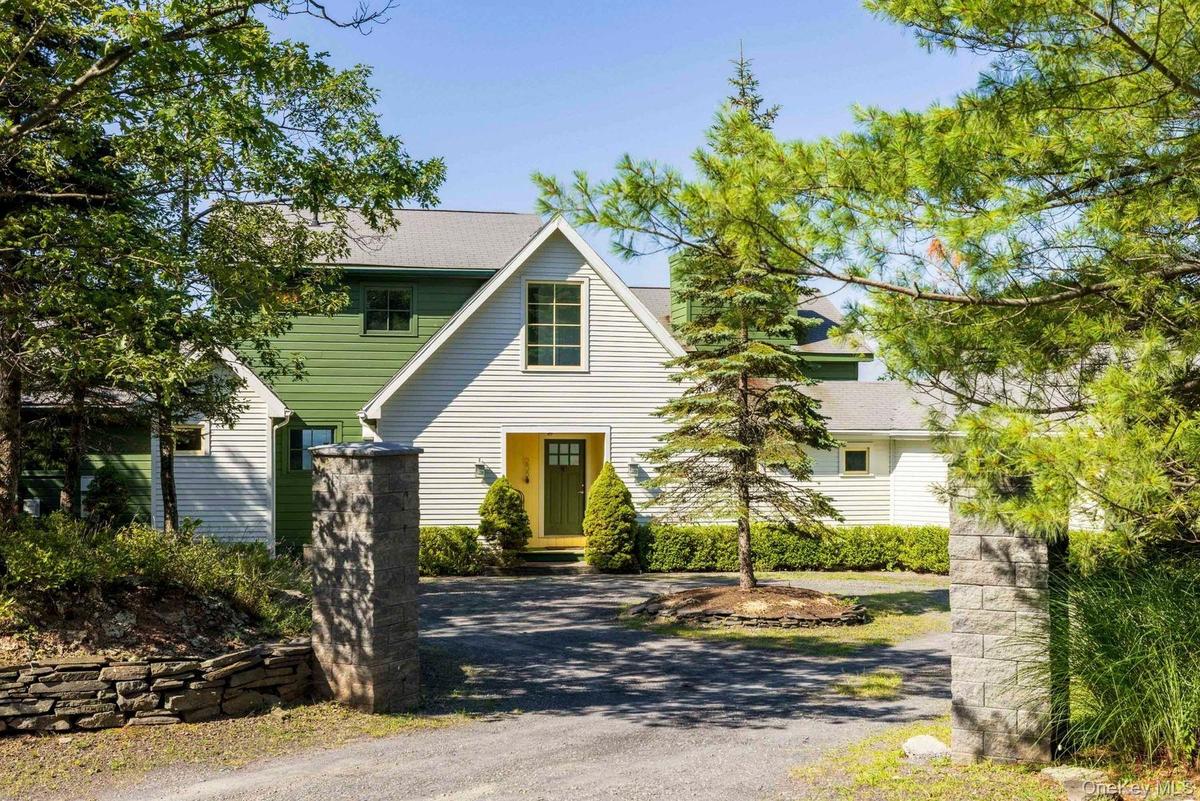 Stone pillars and circular driveway