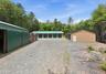 Two 6 Car Garages, Plus Additional Outbuildings