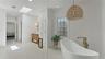 Primary ensuite bath looking to bedroom