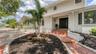 Front of home and path to casita