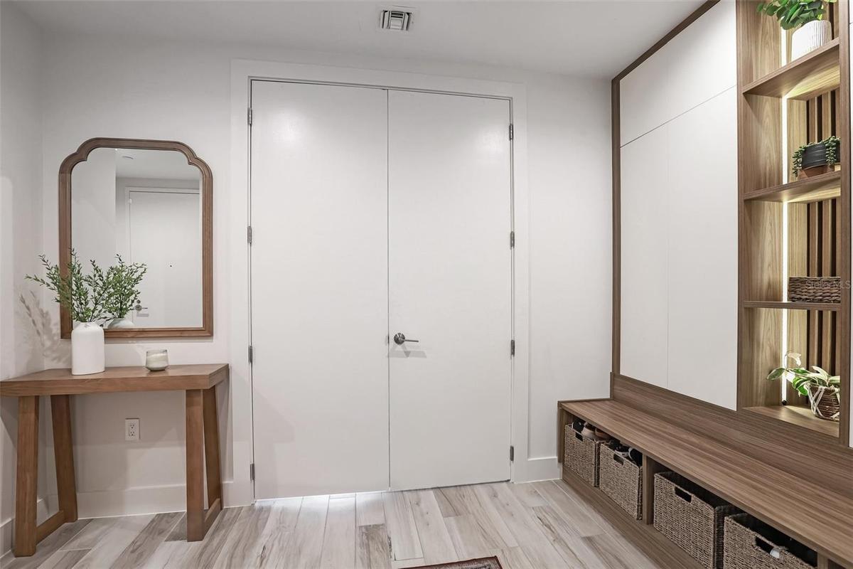 Private foyer entry with built-in storage