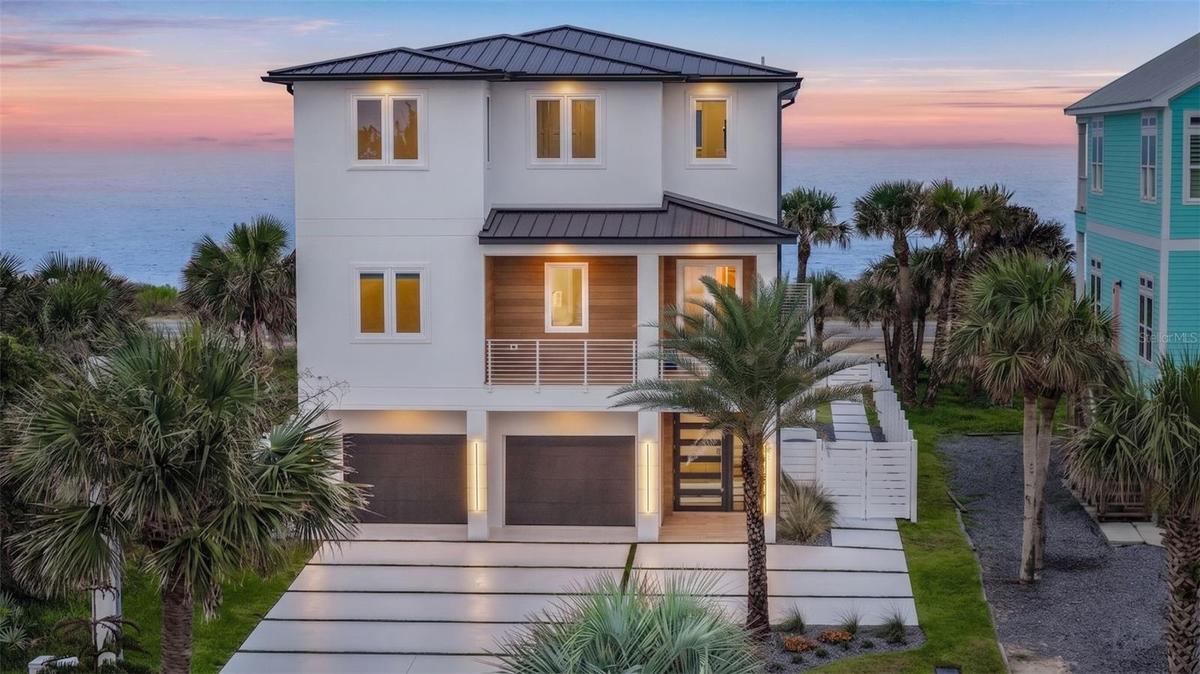 Welcome to 2214 N Central Ave, a shoreline masterpiece in the heart of Flagler Beach.