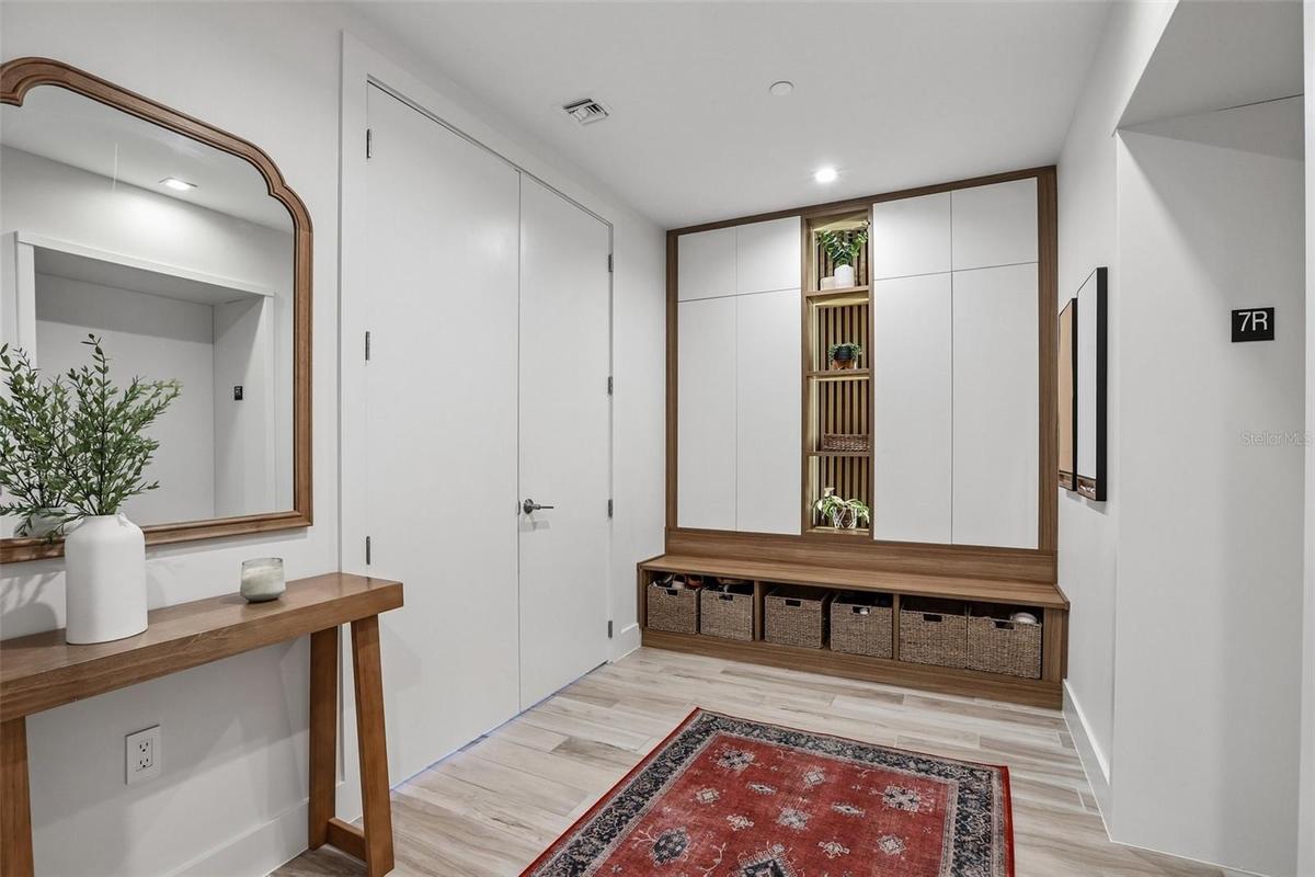 Private foyer entry with built-in storage