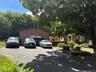 There is a garage and parking on the driveway