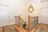 Second floor landing with stylish new bannister.