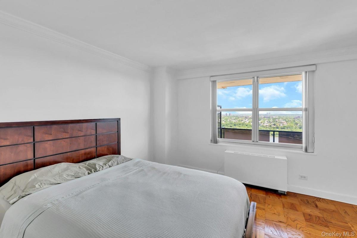 Window overlooks terrace and lakes