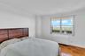 Window overlooks terrace and lakes
