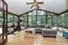 Sun room to enjoy private rear yard and nature.