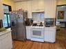 Upgraded kitchen with gas stove.