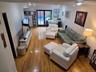 Living room with access to the deck.