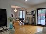 Living Room with Sliding Door Leading to the Deck