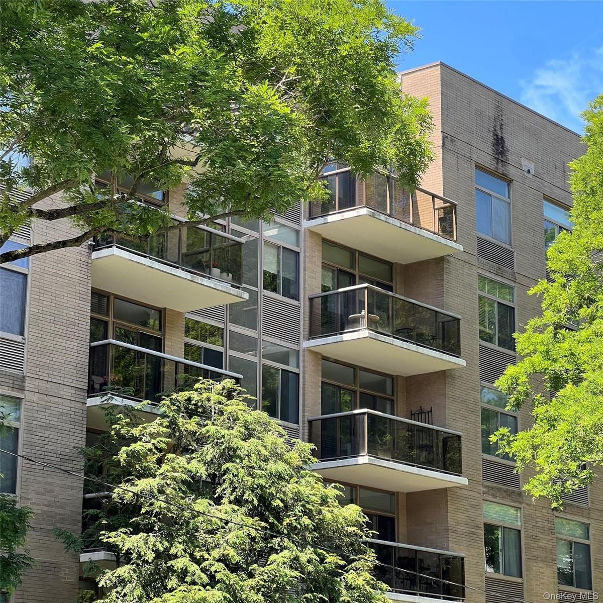 Building facade featuring multiple private balconies