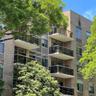 Building facade featuring multiple private balconies