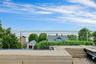 deck with unobstructed river and bridge views