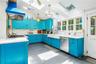 sun flooded kitchen with skylights