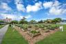 Raised Garden on Large Lawn with Outdoor Seating, Fire Pit with Adirondack Chairs