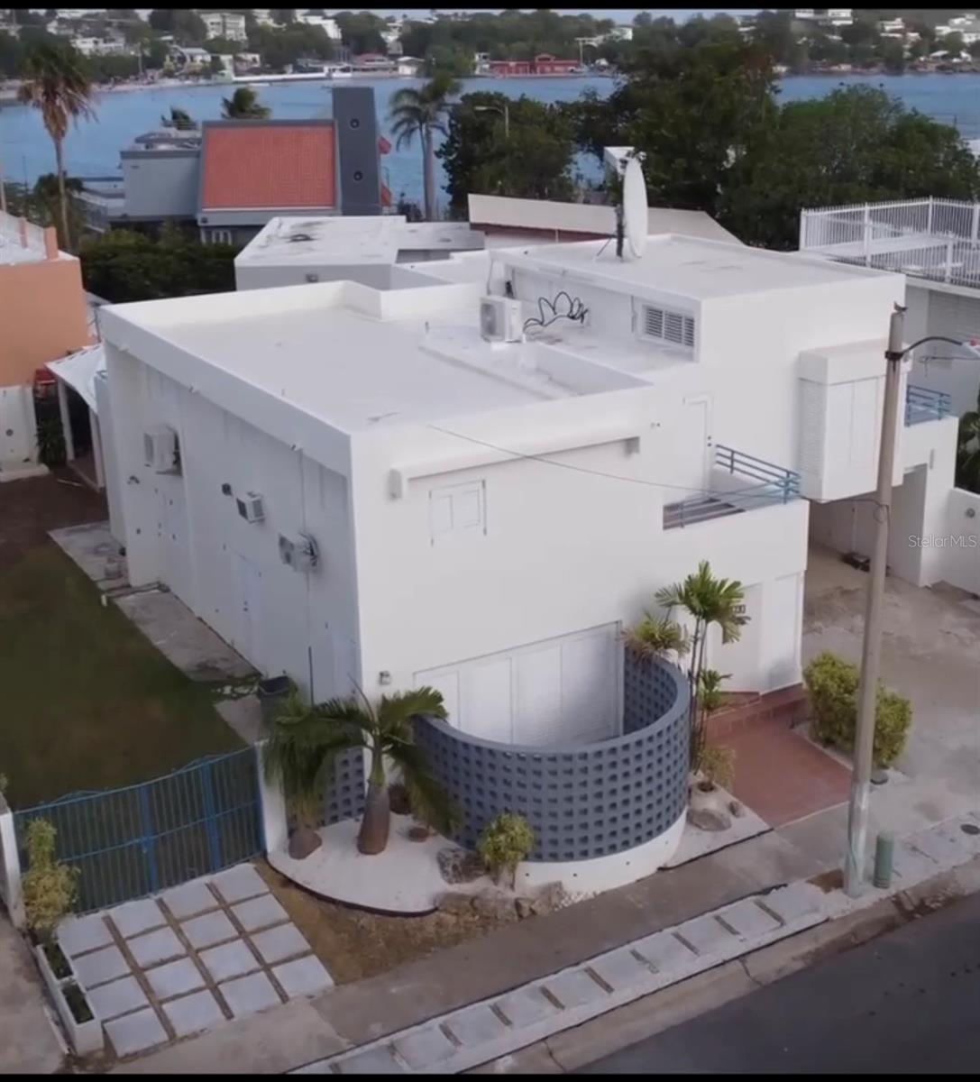 Aerial view of the property and the beach