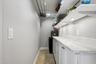 Custom Pantry with Fishing Rod Storage and Room for Tools