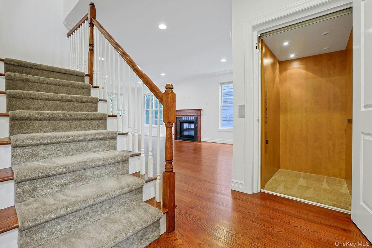 One of Hidden Ridge's most coveted features—a private elevator servicing all three levels, offering exceptional convenience and the ability to comfort